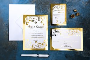 złote ślubne zaproszenie